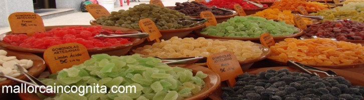 A  market stall offering sweets and dried fruit